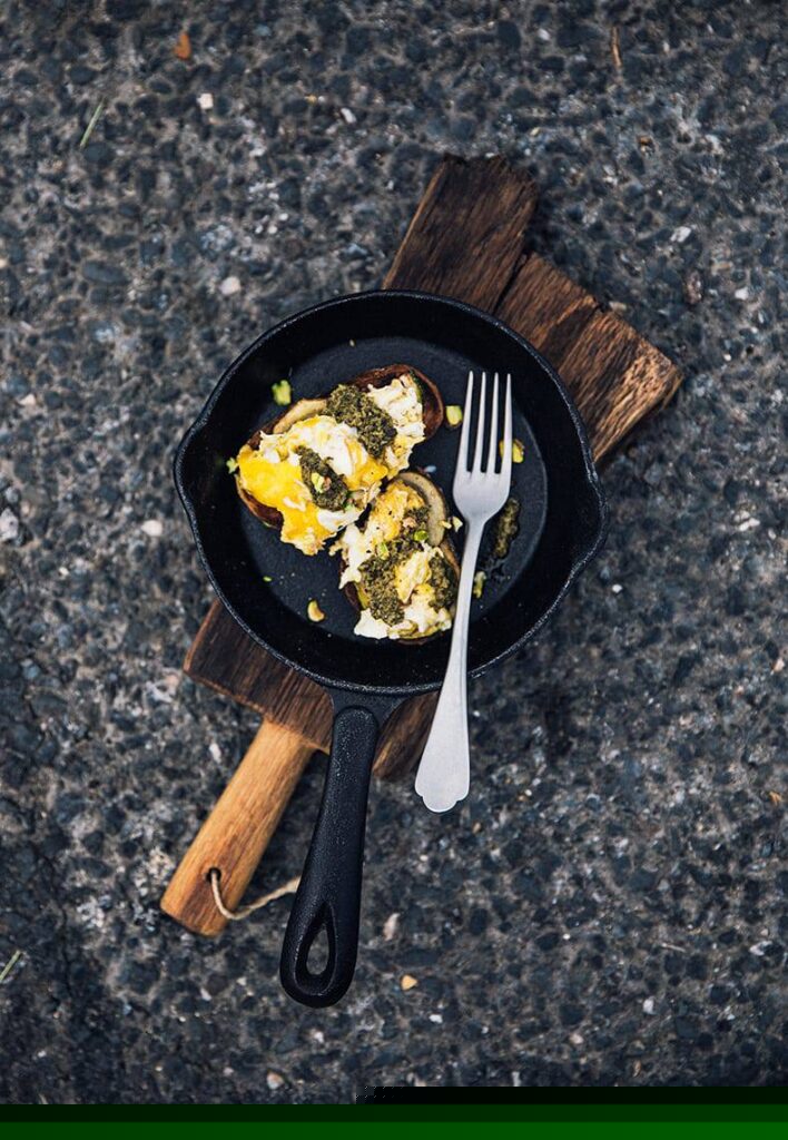 Scrambled egg sandwich with zucchini, pesto and pistachio